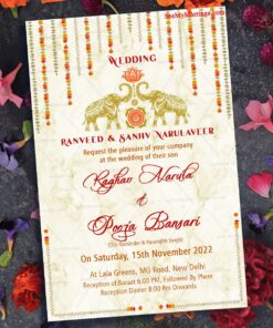 A Wedding Invitation Card Full of Golden Grandeur With Garlands Of Marigold Flowers, Majestic Elephants  And A Pink Lotus